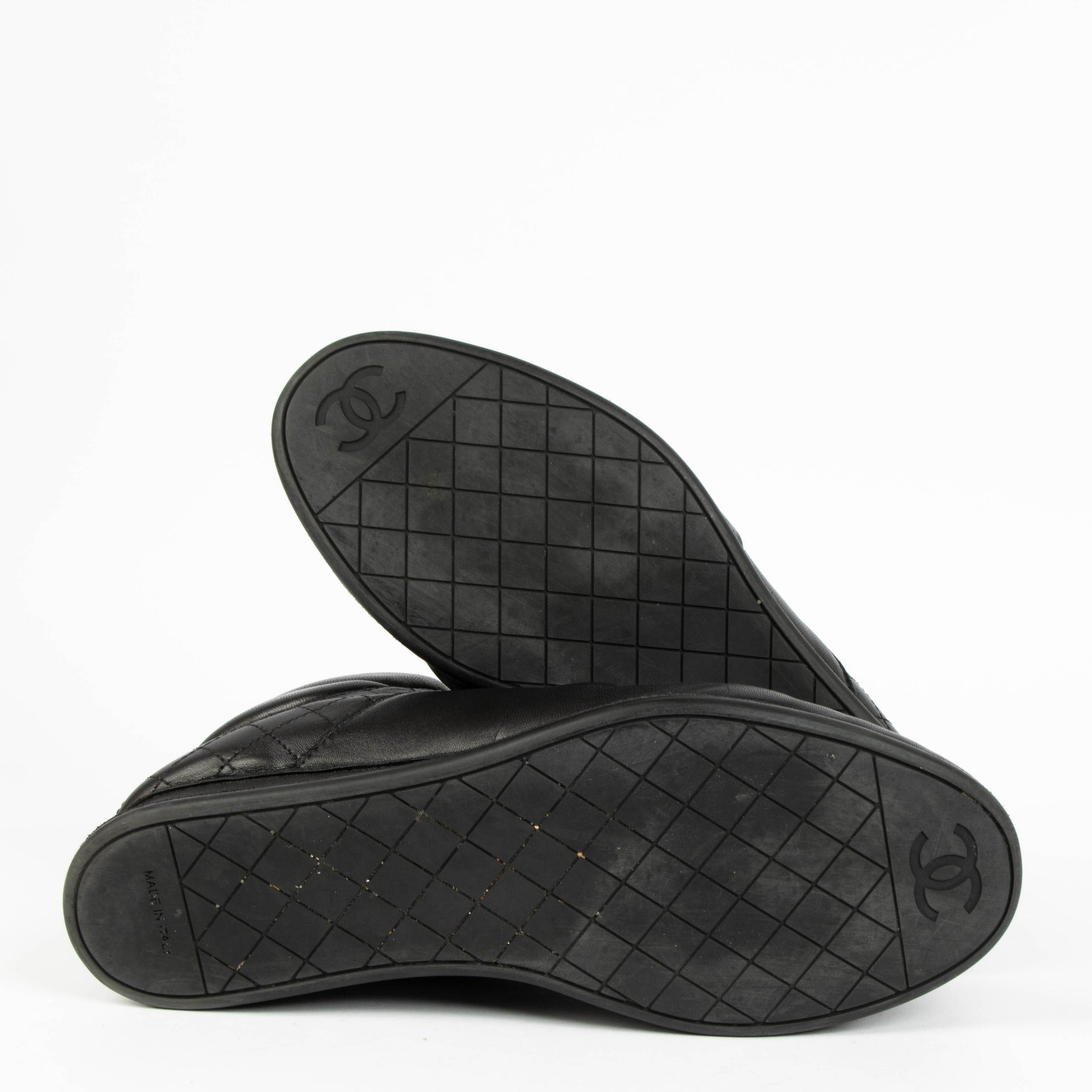 Shop this 100% authentic Chanel Black Sneakers – Size 38.5 at Labellov.com