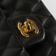 Shop the authentic Chanel Black Lambsbkin Medium Classic 11.12 Bag second hand on Labellov.com