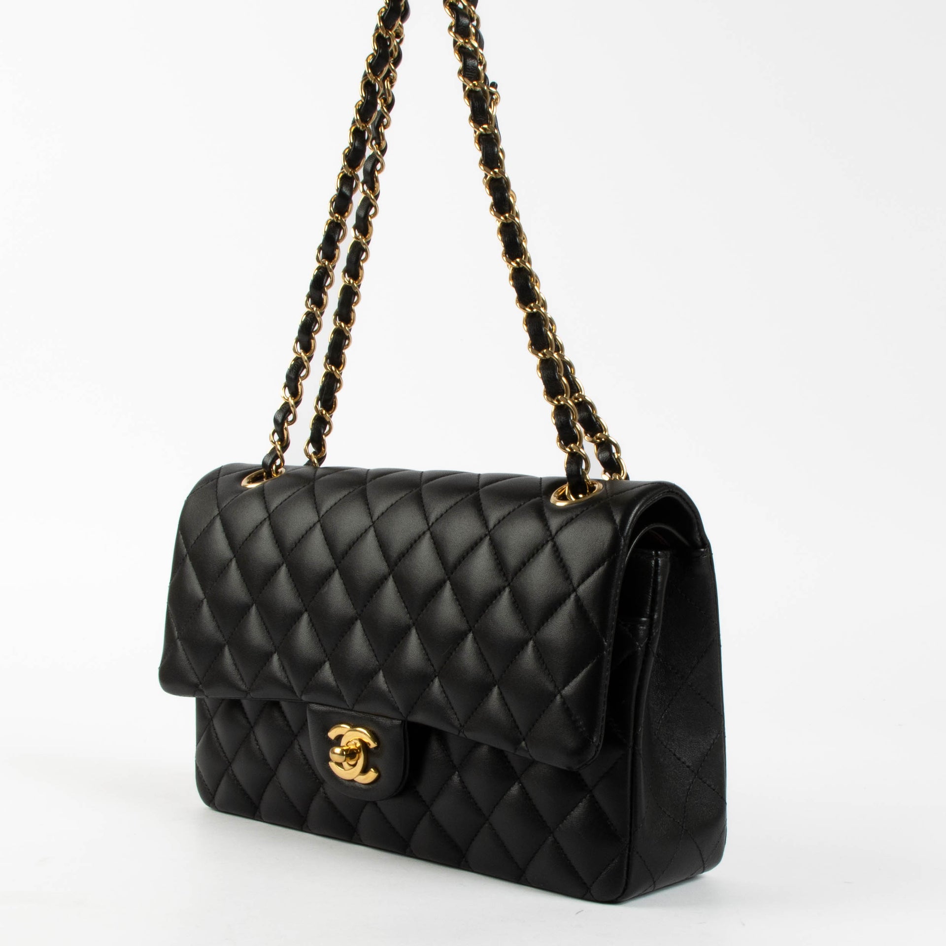 Shop the authentic Chanel Black Lambsbkin Medium Classic 11.12 Bag second hand on Labellov.com