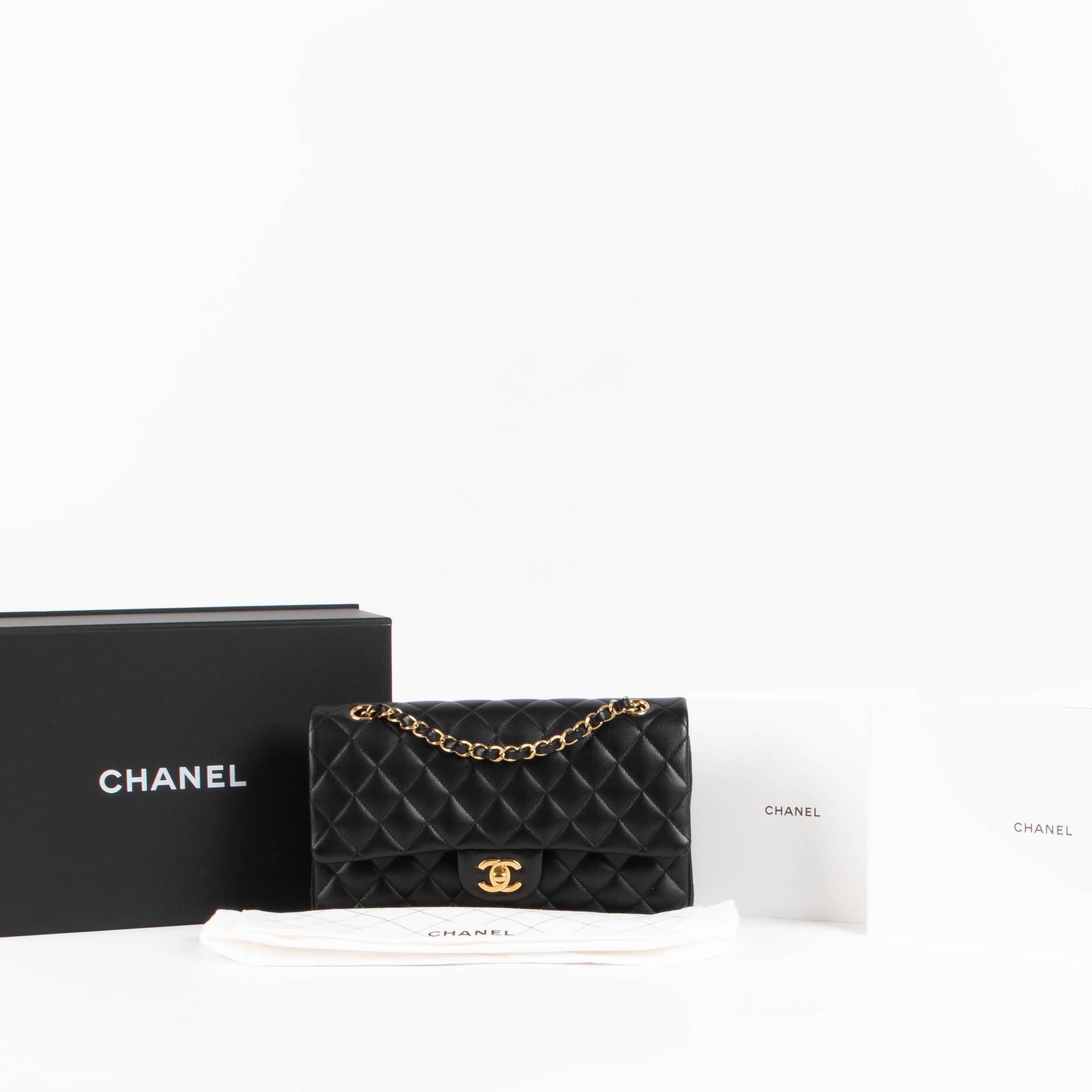 Shop the authentic Chanel Black Lambsbkin Medium Classic 11.12 Bag second hand on Labellov.com