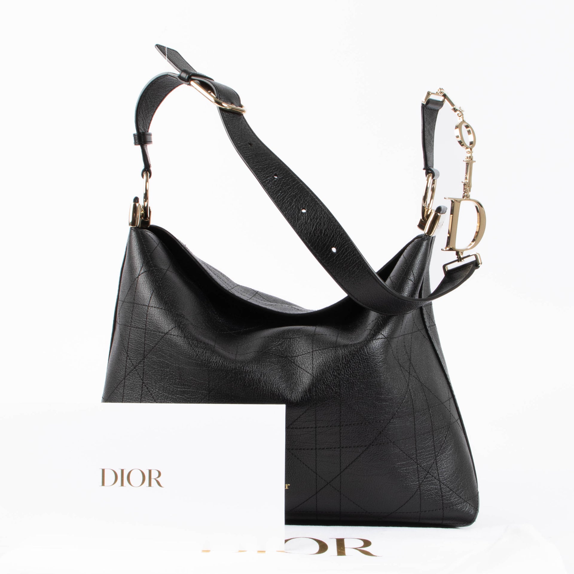 Shop the authentic Christian Dior Black Flat Cannage Large Diorly Shoulder Bag second hand on Labellov.com