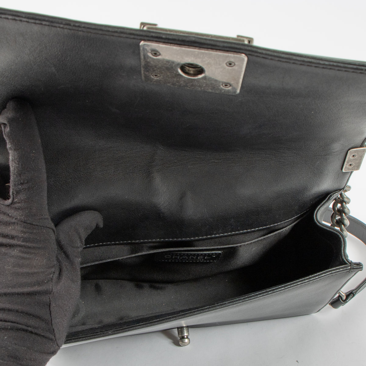 Shop this authentic Chanel Black Medium Boy Chanel Bag pre-loved on Labellov.com