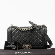 Shop this authentic Chanel Black Medium Boy Chanel Bag pre-loved on Labellov.com