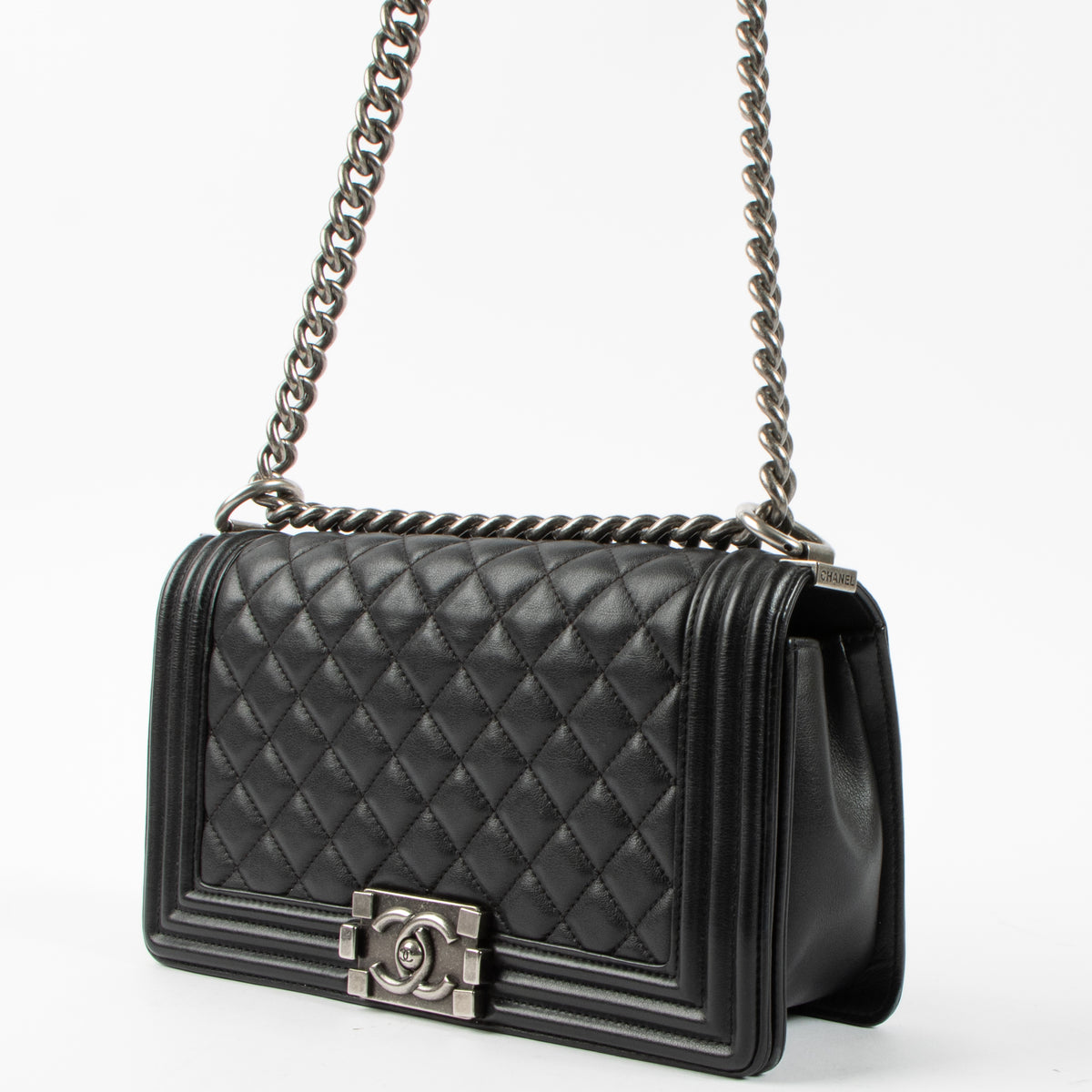 Shop this authentic Chanel Black Medium Boy Chanel Bag pre-loved on Labellov.com