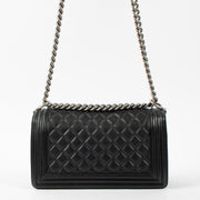 Shop this authentic Chanel Black Medium Boy Chanel Bag pre-loved on Labellov.com