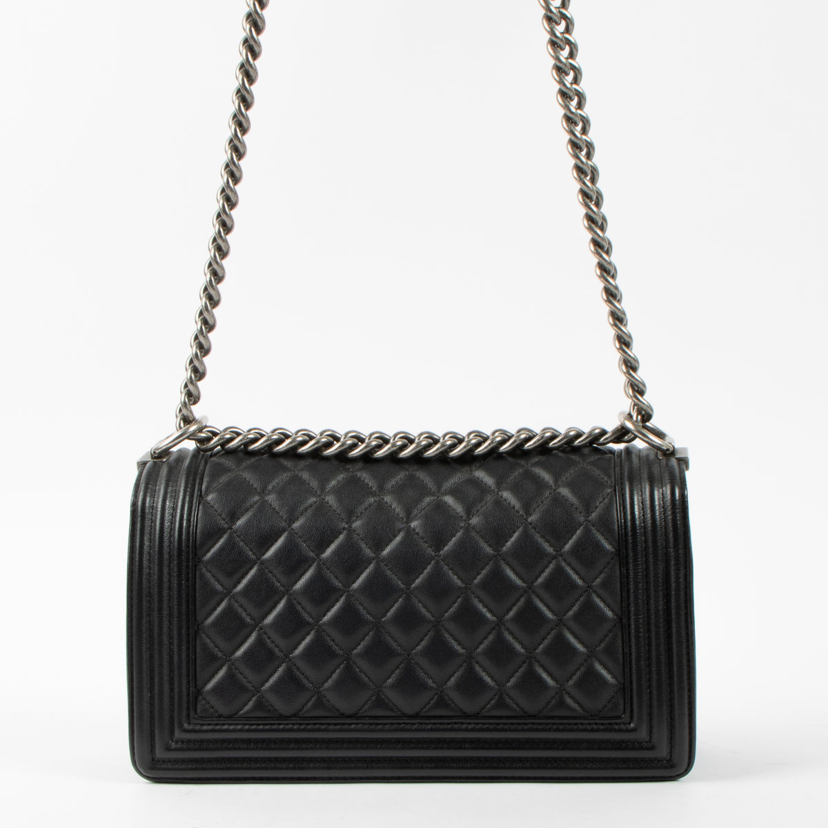 Shop this authentic Chanel Black Medium Boy Chanel Bag pre-loved on Labellov.com