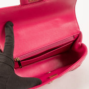Shop this authentic Chanel Pink Lambskin Mini Classic Bag with Crystal Embellished Handle pre-loved on Labellov.com 