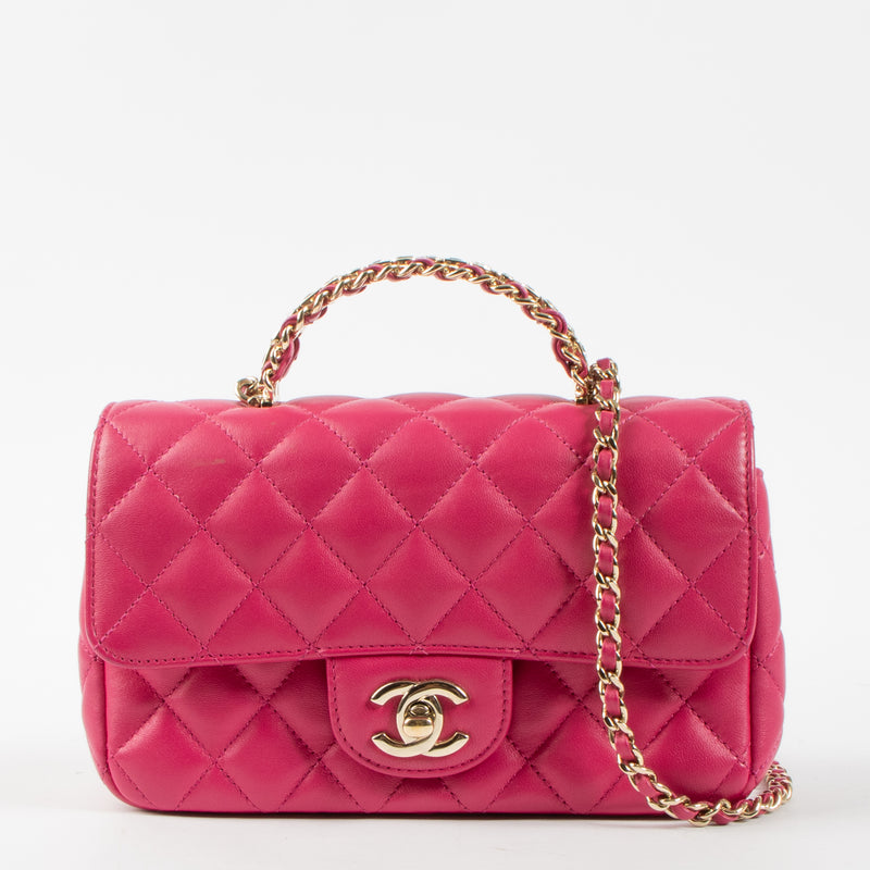 Shop this authentic Chanel Pink Lambskin Mini Classic Bag with Crystal Embellished Handle pre-loved on Labellov.com 
