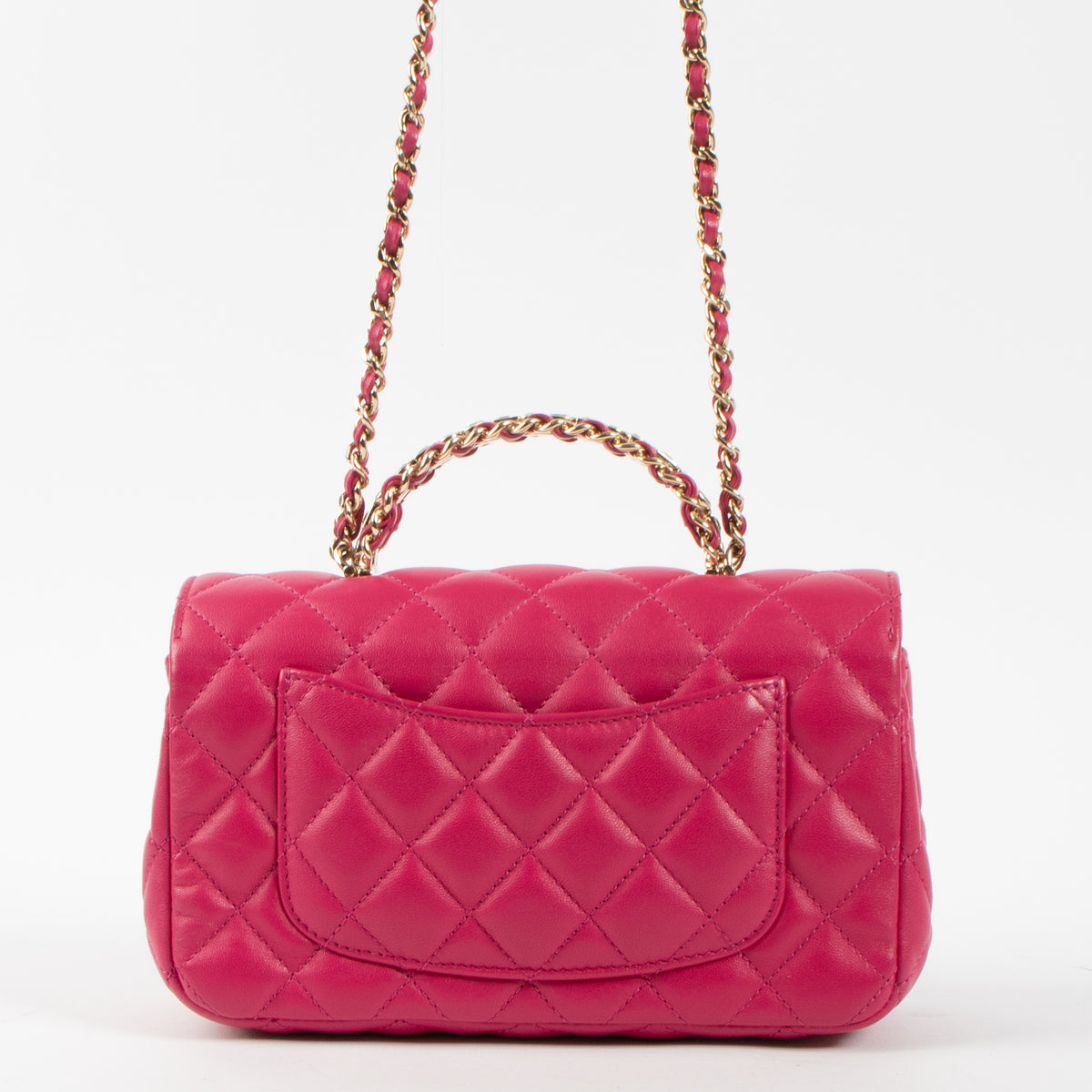 Shop this authentic Chanel Pink Lambskin Mini Classic Bag with Crystal Embellished Handle pre-loved on Labellov.com 