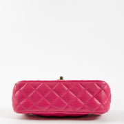 Shop this authentic Chanel Pink Lambskin Mini Classic Bag with Crystal Embellished Handle pre-loved on Labellov.com 