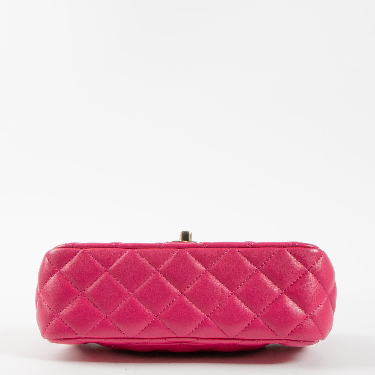 Shop this authentic Chanel Pink Lambskin Mini Classic Bag with Crystal Embellished Handle pre-loved on Labellov.com 