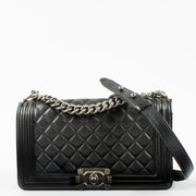 Shop this authentic Chanel Black Medium Boy Chanel Bag pre-loved on Labellov.com