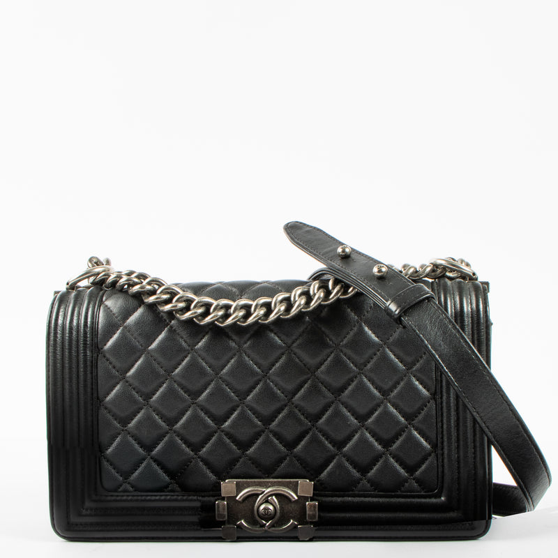 Shop this authentic Chanel Black Medium Boy Chanel Bag pre-loved on Labellov.com