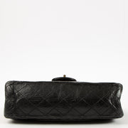 Shop this authentic Chanel Black Aged Calfskin Medium Reissue 2.55 Bag pre-loved on Labellov.com