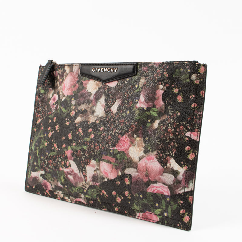Shop the authentic Givenchy Black Floral Printed Leather Clutch on Labellov.com !