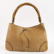 Shop this authentic Gucci Beige Leather Drawstring Bag pre-loved on Labellov.com