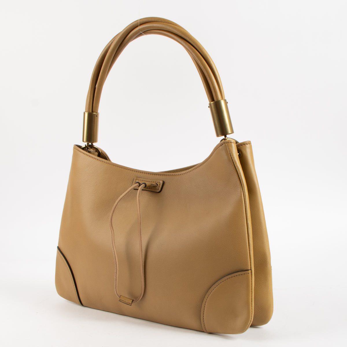 Shop this authentic Gucci Beige Leather Drawstring Bag pre-loved on Labellov.com