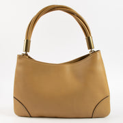 Shop this authentic Gucci Beige Leather Drawstring Bag pre-loved on Labellov.com