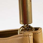 Shop this authentic Gucci Beige Leather Drawstring Bag pre-loved on Labellov.com