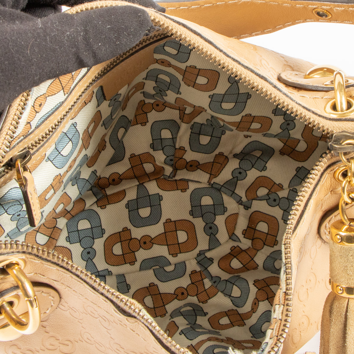 Shop this authentic Gucci Beige Guccissima Babouska Heart Small Hobo Bag Pre-Loved on Labellov.com