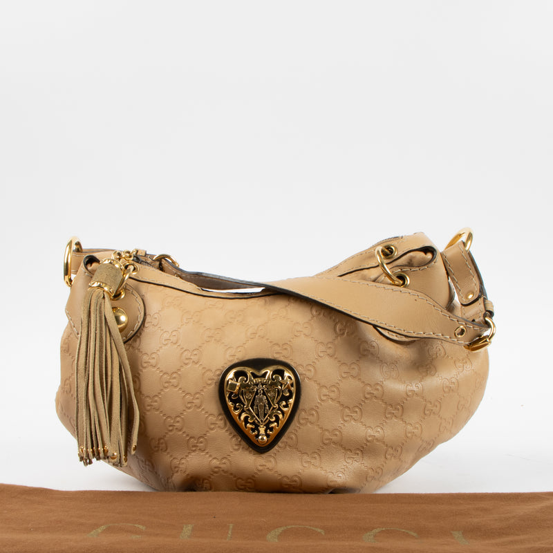 Shop this authentic Gucci Beige Guccissima Babouska Heart Small Hobo Bag Pre-Loved on Labellov.com