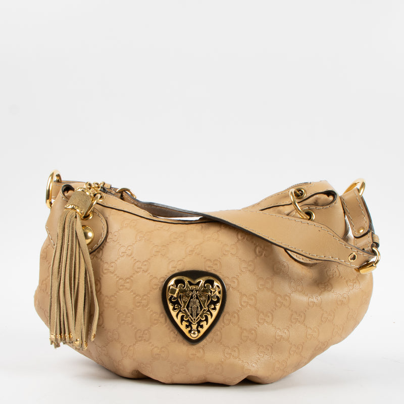 Shop this authentic Gucci Beige Guccissima Babouska Heart Small Hobo Bag Pre-Loved on Labellov.com