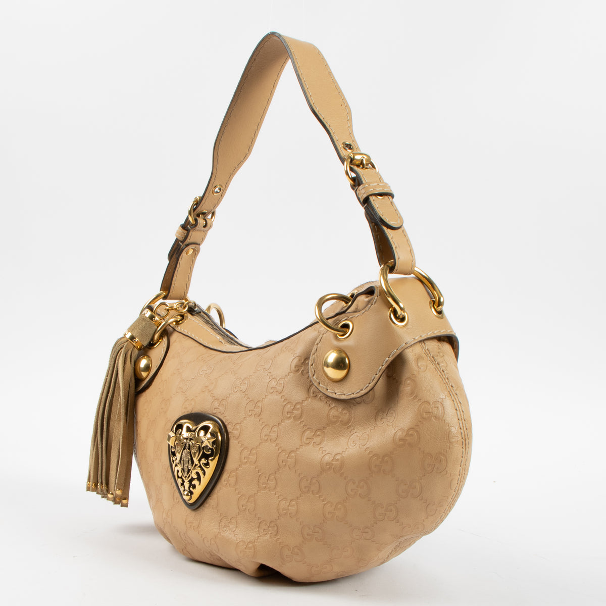 Shop this authentic Gucci Beige Guccissima Babouska Heart Small Hobo Bag Pre-Loved on Labellov.com