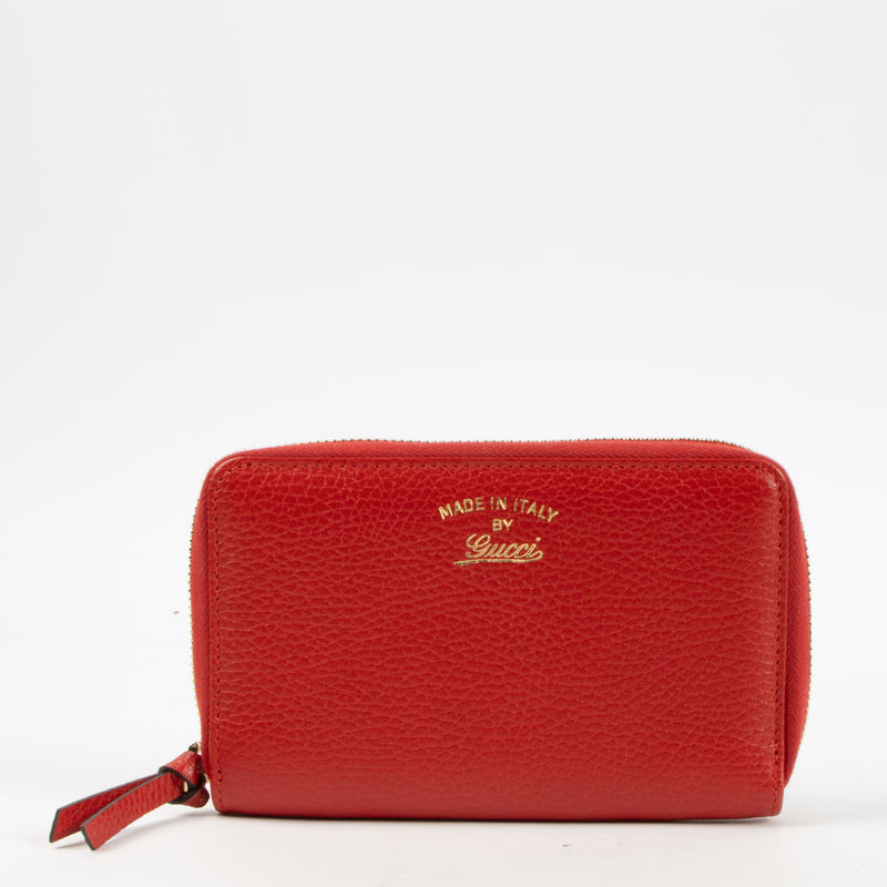 Shop this authentic Gucci Red Leather Swing Zip Wallet pre-loved on Labellov.com