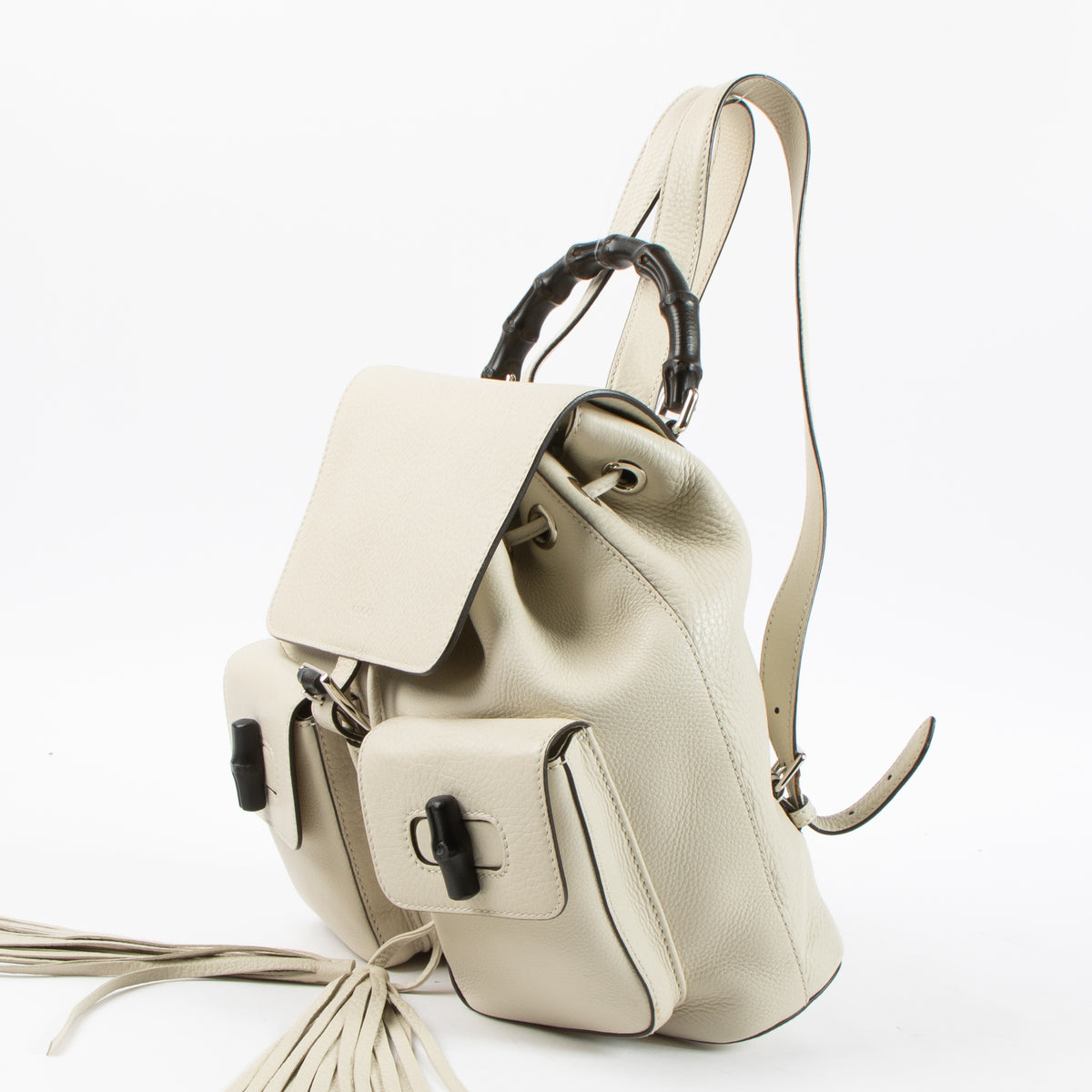 Shop this authentic Gucci White Leather Bamboo Backpack Pre-Loved on Labellov.com