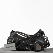 Shop this authentic Balenciaga Black Arena Le Cagole Small Bag pre-loved on Labellov.com 