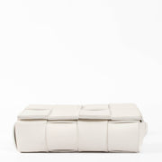 Shop this authentic Bottega Veneta White Mini Cassette Belt bag pre-loved on Labellov.com 