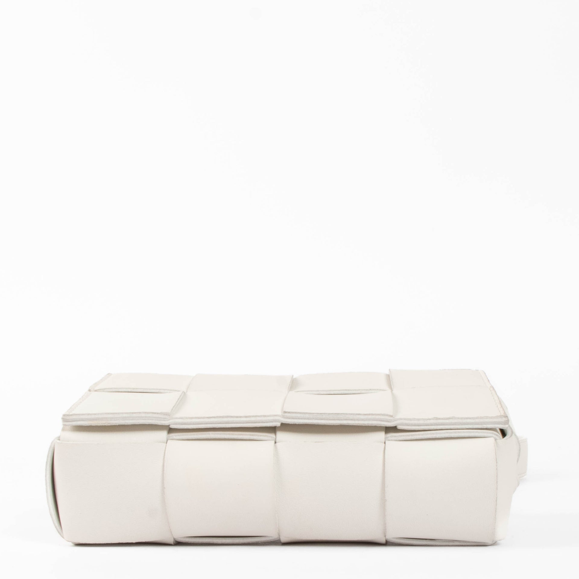 Shop this authentic Bottega Veneta White Mini Cassette Belt bag pre-loved on Labellov.com 