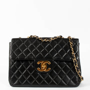 Shop this authentic Chanel Vintage Black Jumbo/Large XL Flap Bag pre-loved on Labellov.com 