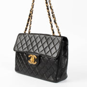 Shop this authentic Chanel Vintage Black Jumbo/Large XL Flap Bag pre-loved on Labellov.com 