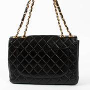 Shop this authentic Chanel Vintage Black Jumbo/Large XL Flap Bag pre-loved on Labellov.com 