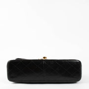 Shop this authentic Chanel Vintage Black Jumbo/Large XL Flap Bag pre-loved on Labellov.com 