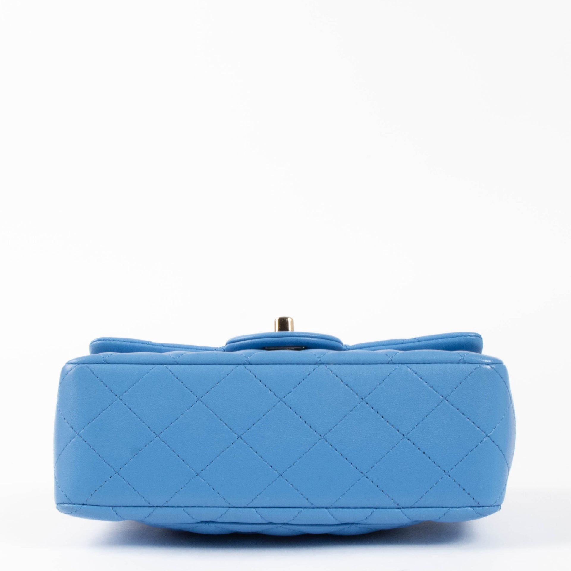 Shop this authentic Chanel Blue Lambskin Mini Flap Bag with Handle pre-loved on Labellov.com