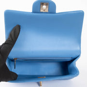Shop this authentic Chanel Blue Lambskin Mini Flap Bag with Handle pre-loved on Labellov.com