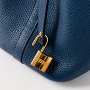 Shop this authentic Hermès Picotin Lock 18 Deep Blue GHW pre-loved on Labellov.com