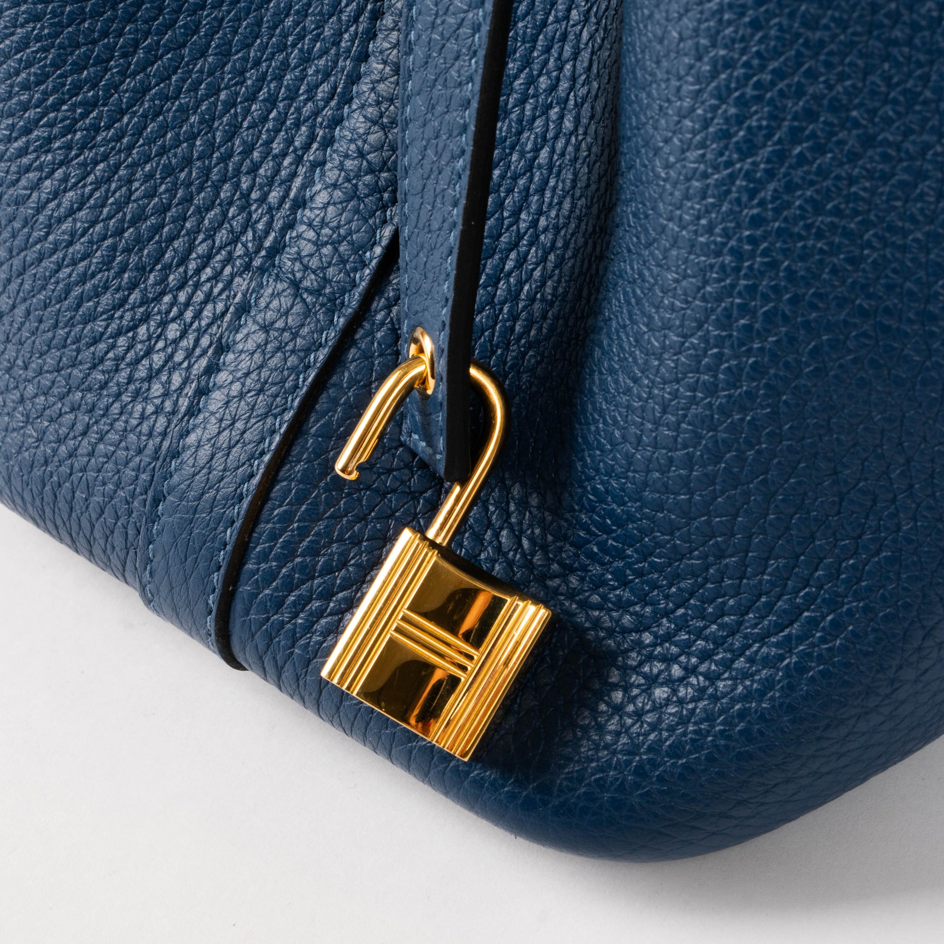 Shop this authentic Hermès Picotin Lock 18 Deep Blue GHW pre-loved on Labellov.com