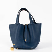 Shop this authentic Hermès Picotin Lock 18 Deep Blue GHW pre-loved on Labellov.com