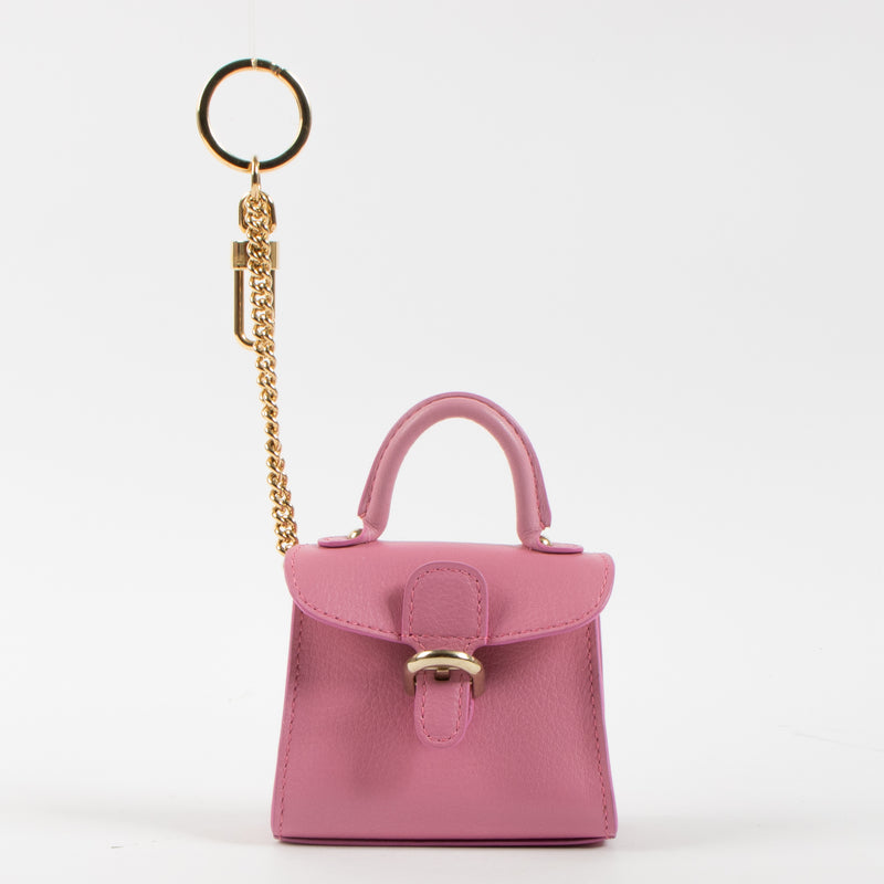 Shop the authentic Delvaux Rose Candy Calf Souple Brillant Charms second hand on Labellov.com!