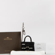 Shop the authentic Delvaux Black L'Humour Brillant Charm second hand on Labellov.com!
