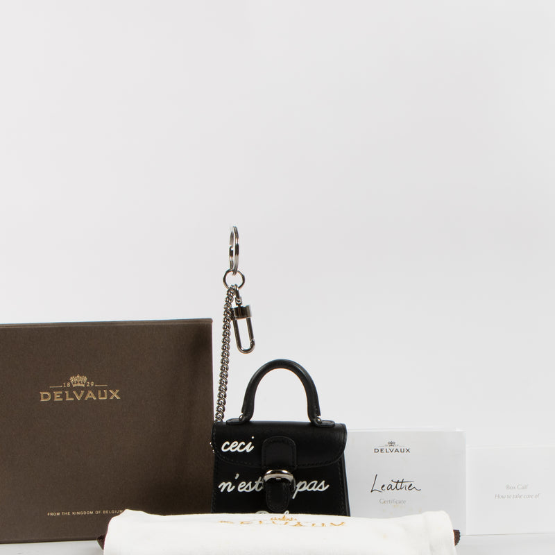 Shop the authentic Delvaux Black L'Humour Brillant Charm second hand on Labellov.com!