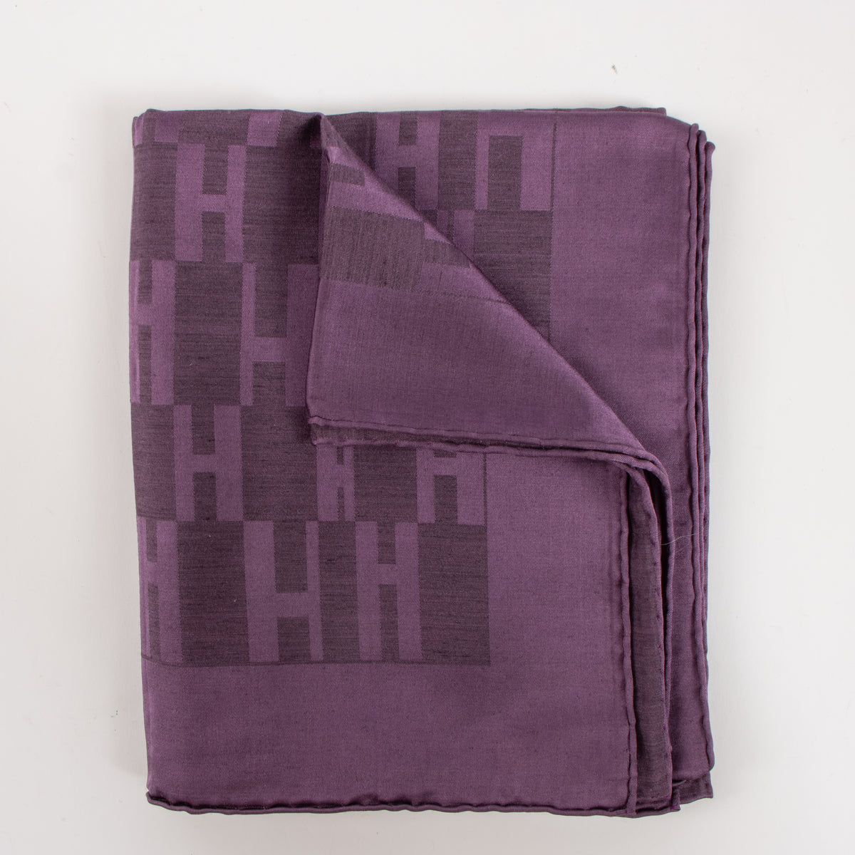 Shop the authentic Hermes Purple Silk/Wool Blend Facinnee Grand H Scarf second hand on Labellov.com!