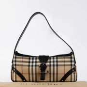 Shop this 100% authentic Burberry Beige Check Baguette Bag at Labellov.com