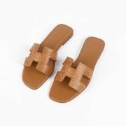 Shop the authentic Hermes Oran Brown Embroidered Sandals - Size 37 brand-new on Labellov.com