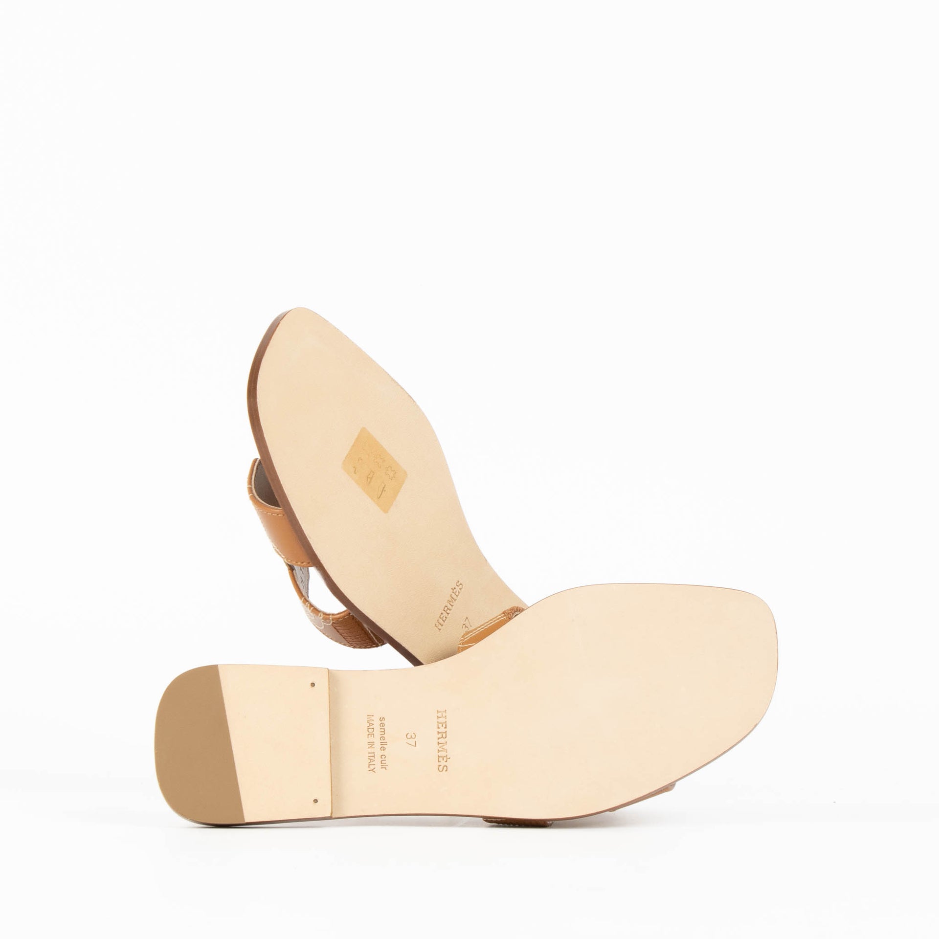 Shop the authentic Hermes Oran Brown Embroidered Sandals - Size 37 brand-new on Labellov.com