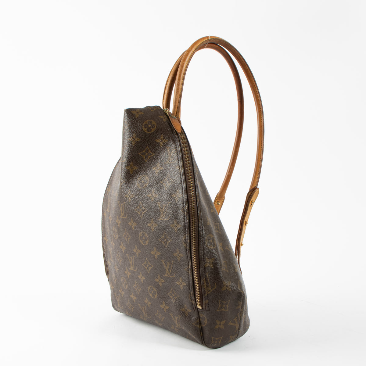 Shop this authentic luxury Louis Vuitton Centenaire Limited Edition Monogram Sybilla Backpack pre-loved on Labellov.com