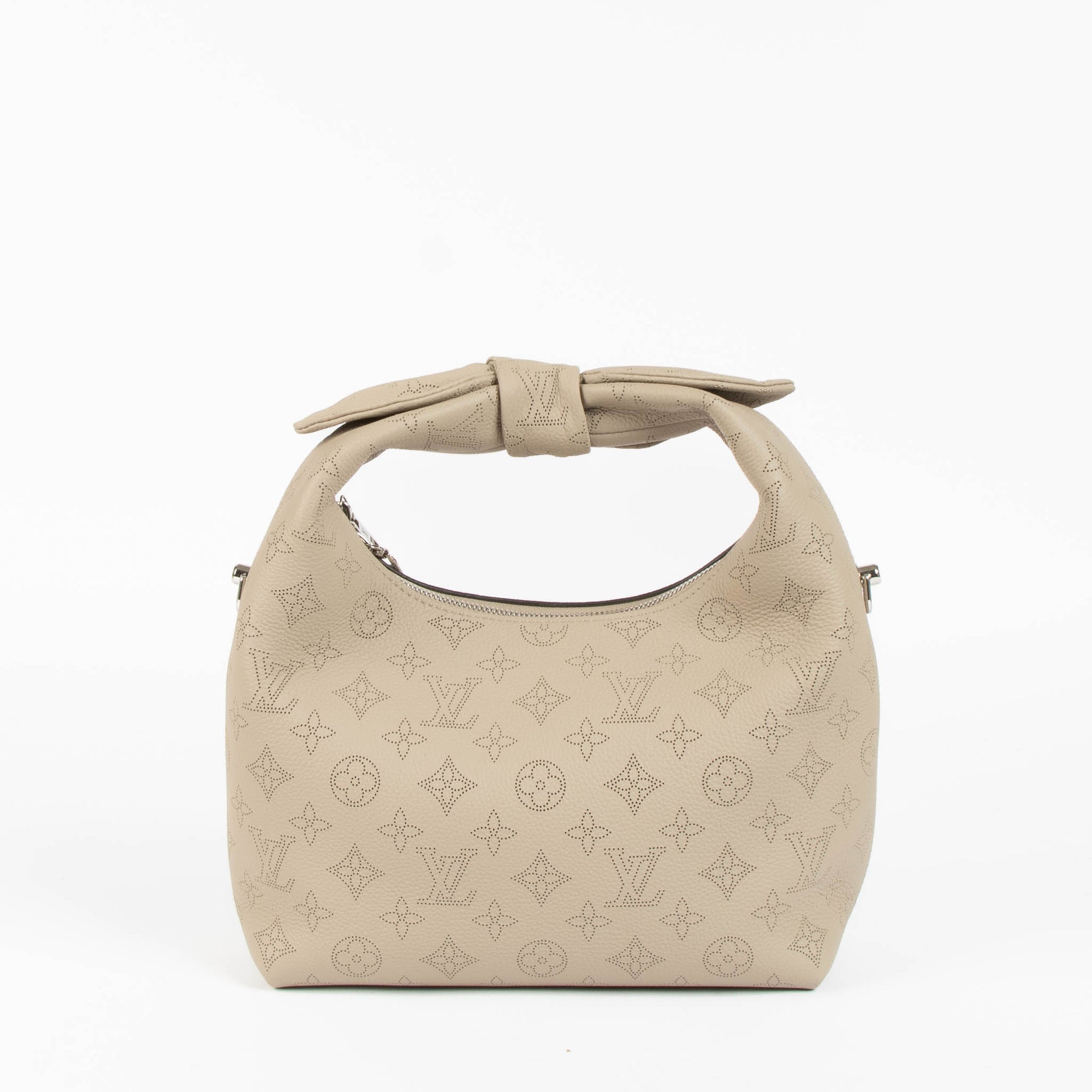 Shop this 100% authentic Louis Vuitton Tourterelle Why Knot Bag at Labellov.com